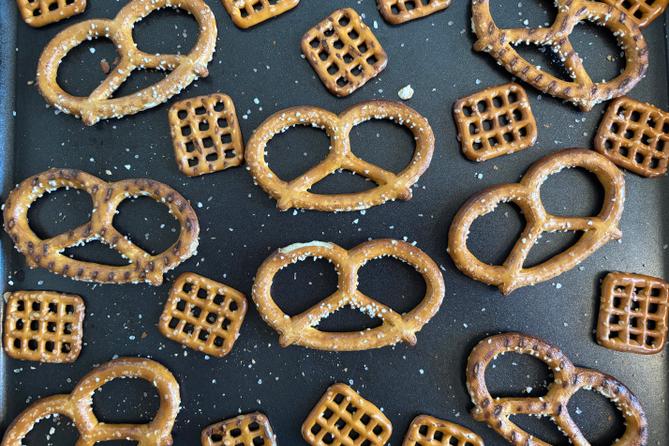 Pretzels laid out on a baking sheet