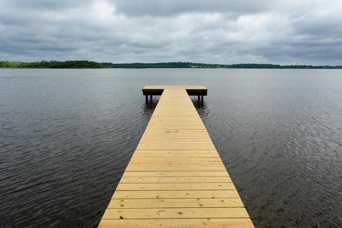 A fishing pier reaches into the mouth of the Appomattox River in Hopewell, VA. A fishing pier reaches into the mouth of the Appomattox River in Hopewell, VA.