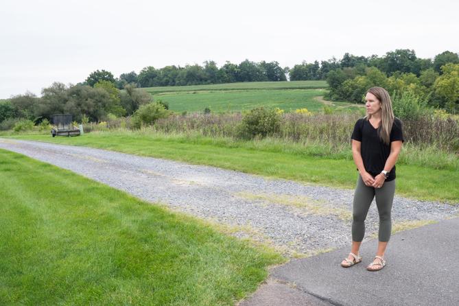 Nicole Williams’ home was built on land that once belonged to the farm behind her, which has been identified as the source of PFAS in her well. Nicole Williams’ home was built on land that once belonged to the farm behind her, which has been identified as the source of PFAS in her well.