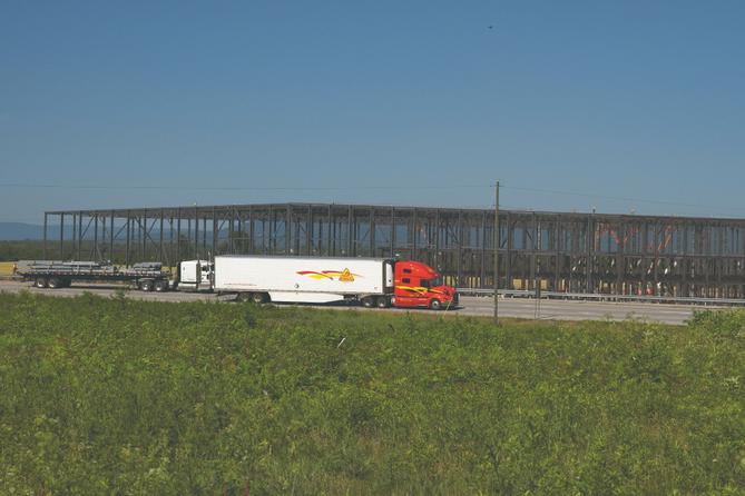 A large warehouse rises along Interstate 81 near Greencastle, PA, in 2021. A large warehouse rises along Interstate 81 near Greencastle, PA, in 2021.