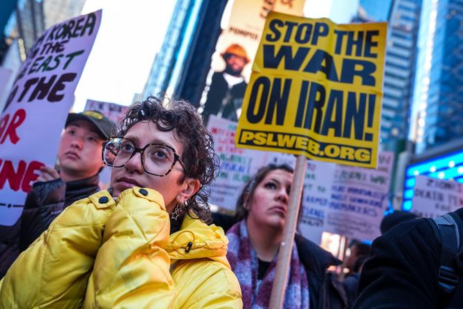 People march while taking part in a protest against the U.S.-Israeli war with Iran, and against conflict in Lebanon, Wednesday, April 8, 2026, in New York.