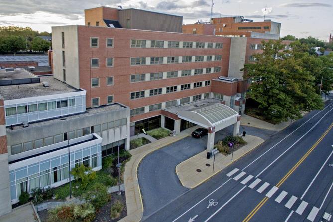 Health care workers in Lancaster are urging UPMC Pinnacle to reopen its recently shuttered hospital, as the number of county cases continues to grow.